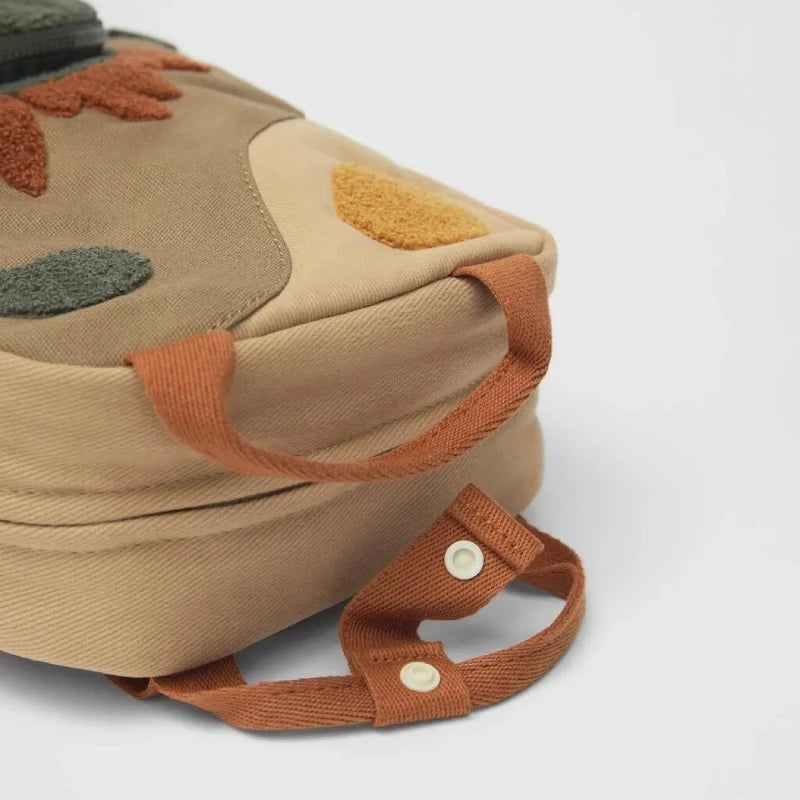 Petit Sac a Dos Enfant détail des anses - Motifs Multiples - Motif Dinosaure - Motif Espace - Motif Fleurs